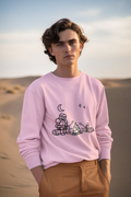 Man wearing a pink Camping Knight and Alien Crewneck Sweatshirt - Mutantur Labs LLC at the beach