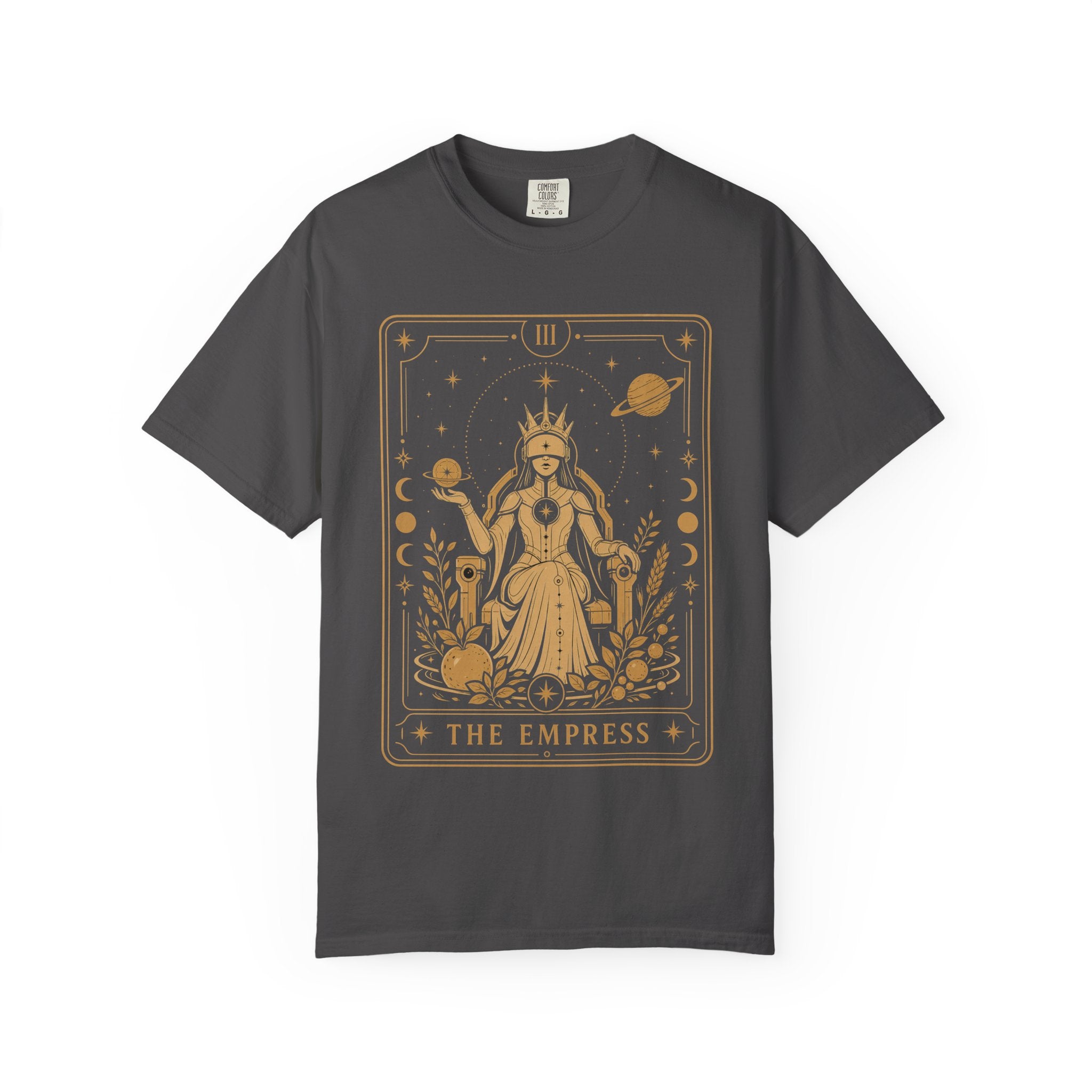 Dark gray Comfort Colors t-shirt featuring The Starseer from the Future Arcana collection, inspired by The High Priestess tarot card. A serene cosmic mystic holds a glowing celestial sphere within an elegant Art Deco frame rendered in gold line art.