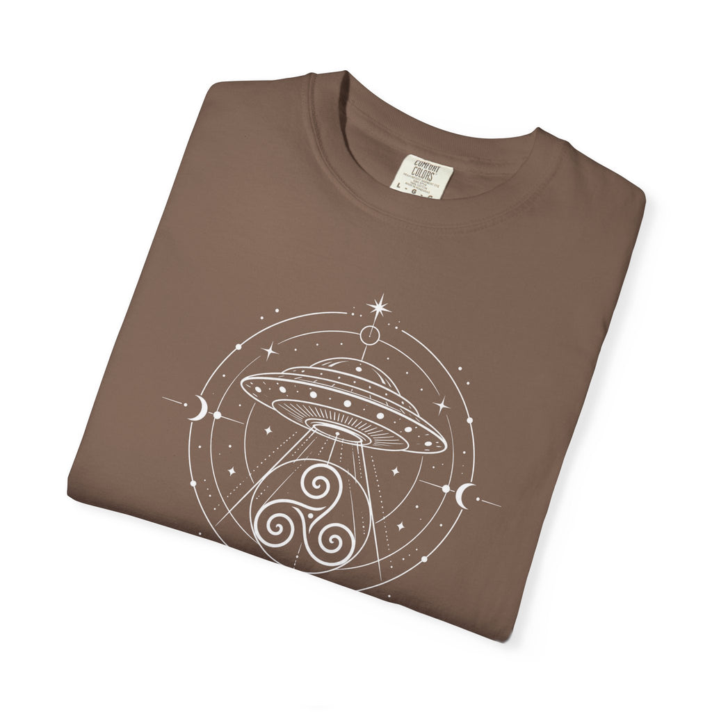 A folded brown t-shirt with a white line design of a flying saucer with an Irisk triskele below and the words ' ALIGN' against a white background