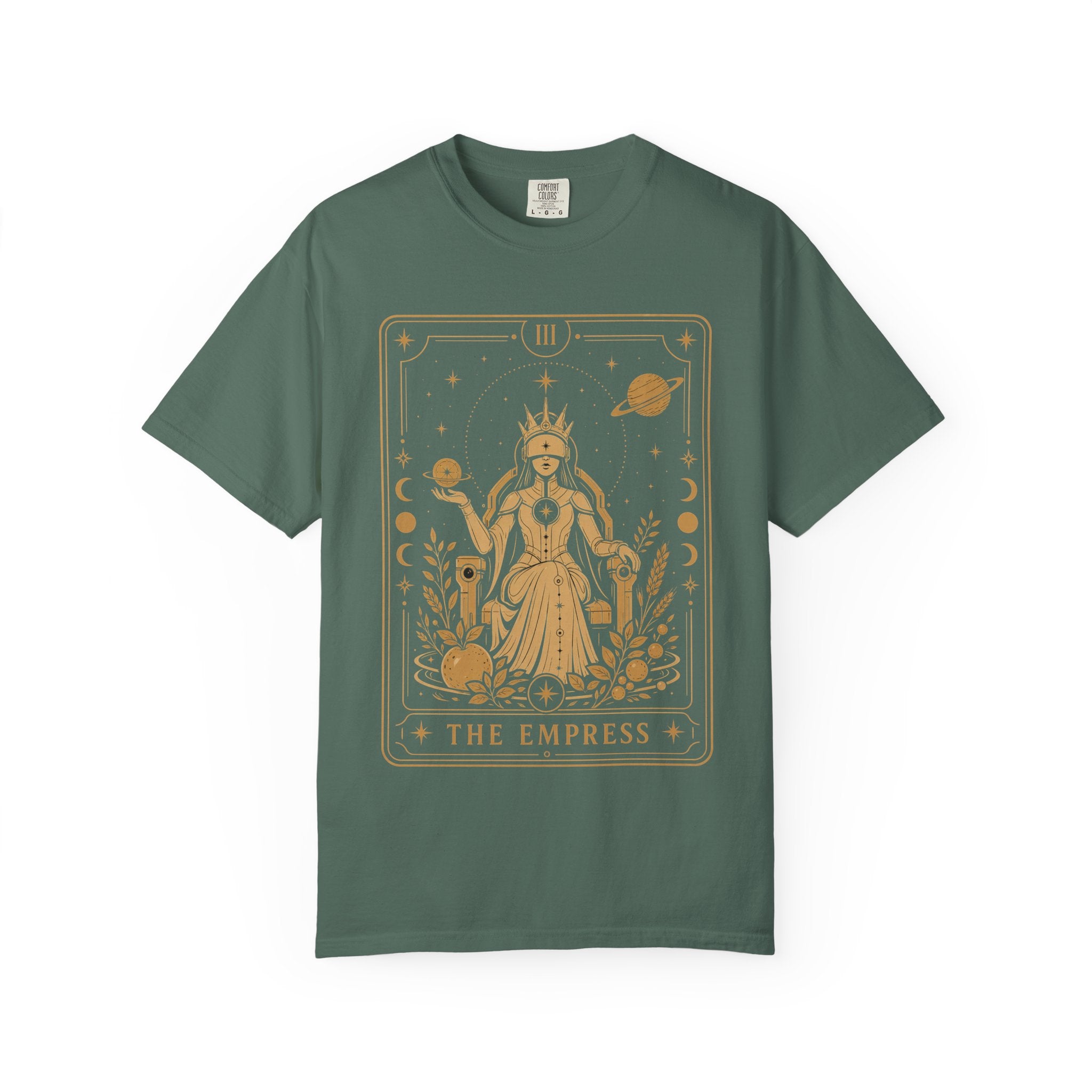 A dark green crew neck t-shirt featuring The Starseer from the Future Arcana collection, inspired by The High Priestess tarot card. A serene cosmic mystic holds a glowing celestial sphere within an elegant Art Deco frame rendered in gold line art.
