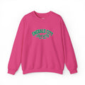 A bright pink pullover crewneck sweatshirt with 'EMERALD CITY Land of Oz EST. 1900' printed in green varsity-style lettering on the chest, displayed against a clean white background.