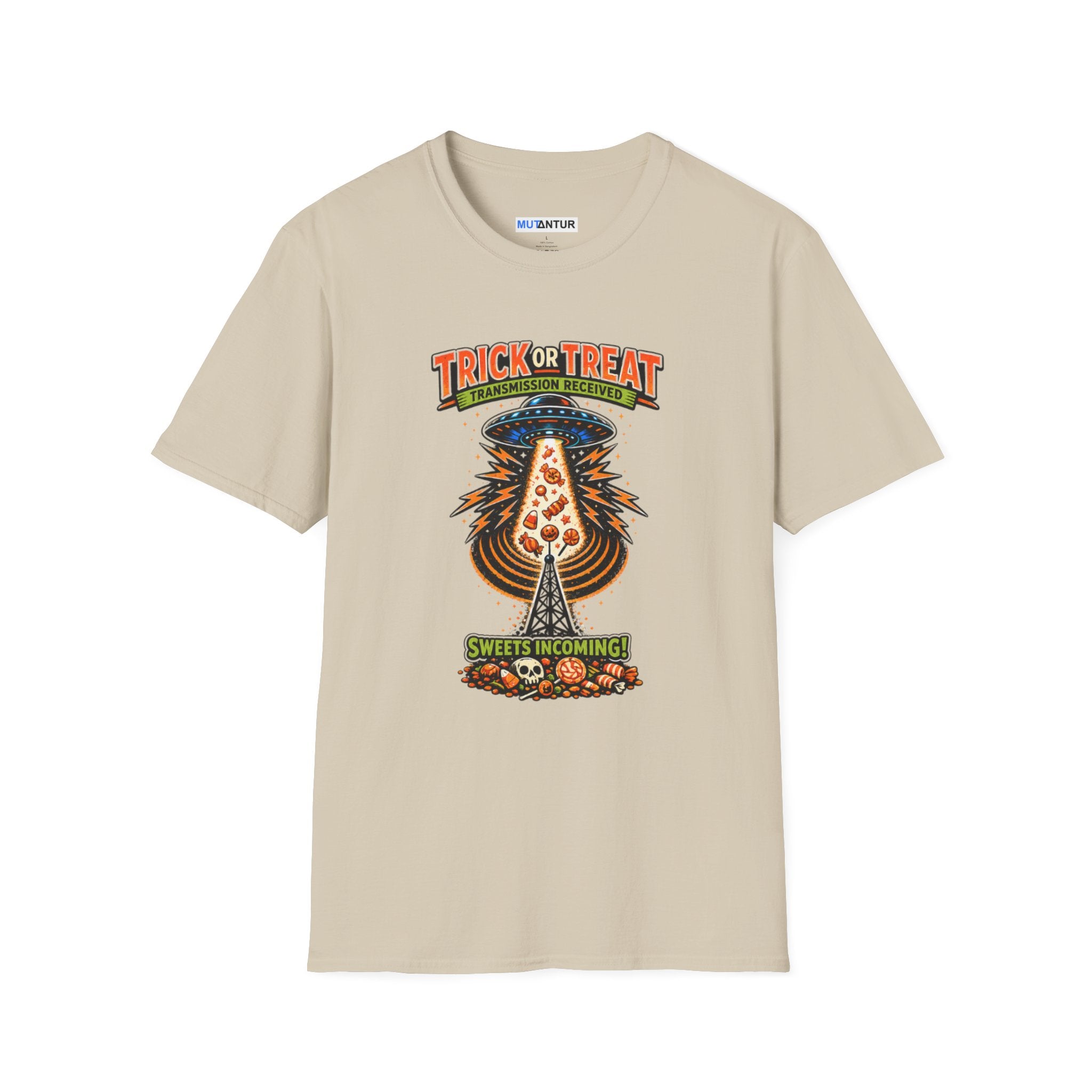 A beige  short-sleeve crewneck t-shirt featuring a colorful graphic print on the front. The graphic shows a UFO Beaming up candy flying upward from a haunted house under the text 'TRICK OR TREAT' and 'SWEETS COMING !', with a small 'MUTANTUR brand label visible inside the collar.