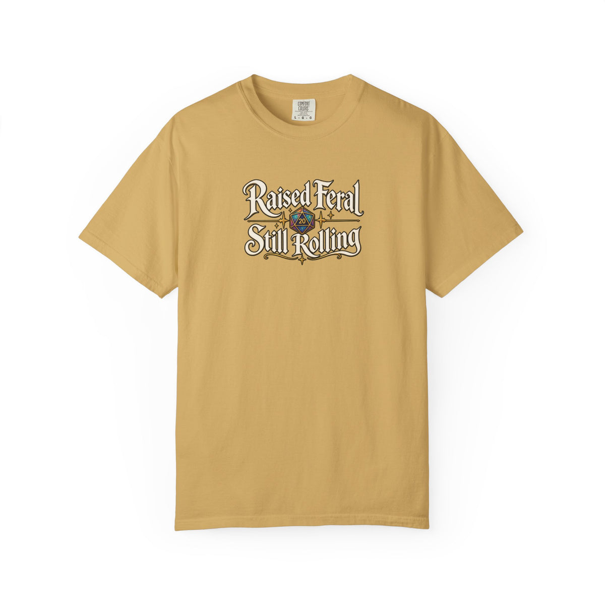 A mustard yellow graphic T-shirt  that features the text 'Raised Feral Still Rolling' with a colorful 20-sided die graphic in the center against a white background
