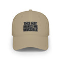 A beige baseball cap with the text 'THIS HAT MAKES ME INVISIBLE' embroidered on the front in black and white, shown against a plain white background.