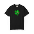 A black short-sleeve crewneck t-shirt featuring a green four-leaf clover graphic on the chest with the text 'REBELS ARE WE' in red, orange, and yellow.