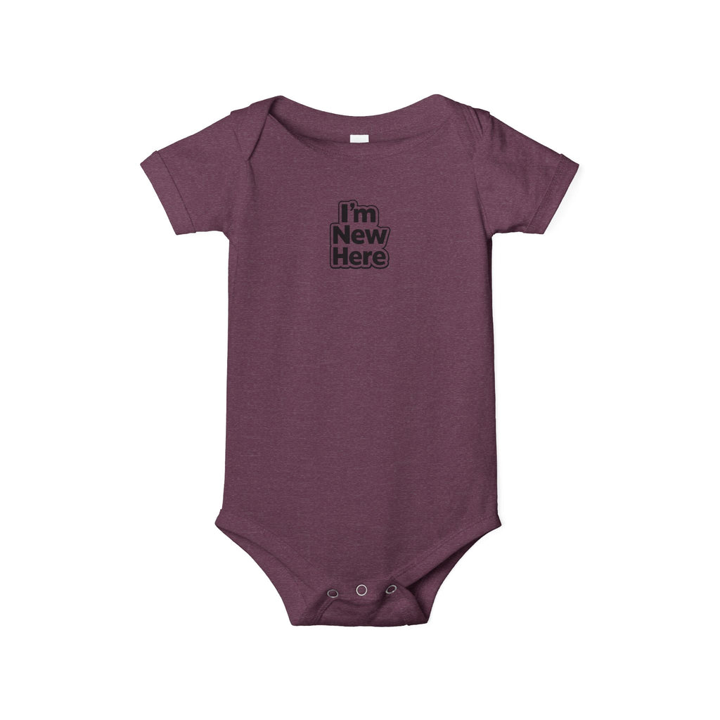 Purple baby onesie with 'I'm New Here' text on a white background