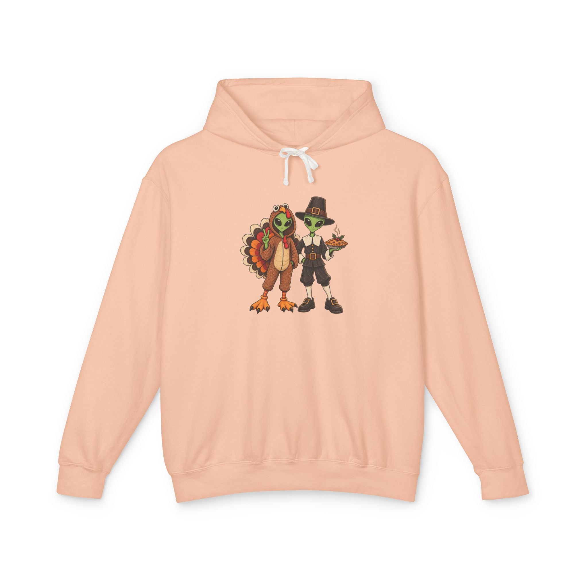 A peach hooded sweatshirt with a central graphic of  cartoon aliens dressed as a  turkey and a pilgrim figure, displayed on a clean white background.