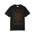 A black short-sleeve crewneck t-shirt featuring a detailed gold 'Wheel of Fortune' tarot card graphic printed on the chest, displayed against a solid white background.