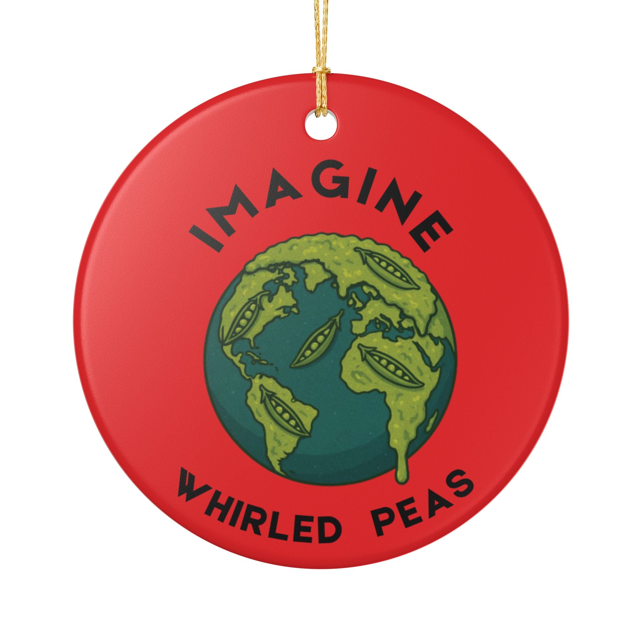 A round red ceramic ornament featuring a green globe illustration with peas inside, and the words 'IMAGINE WHIRLED PEAS' in black text, hanging from a gold string on a white background.