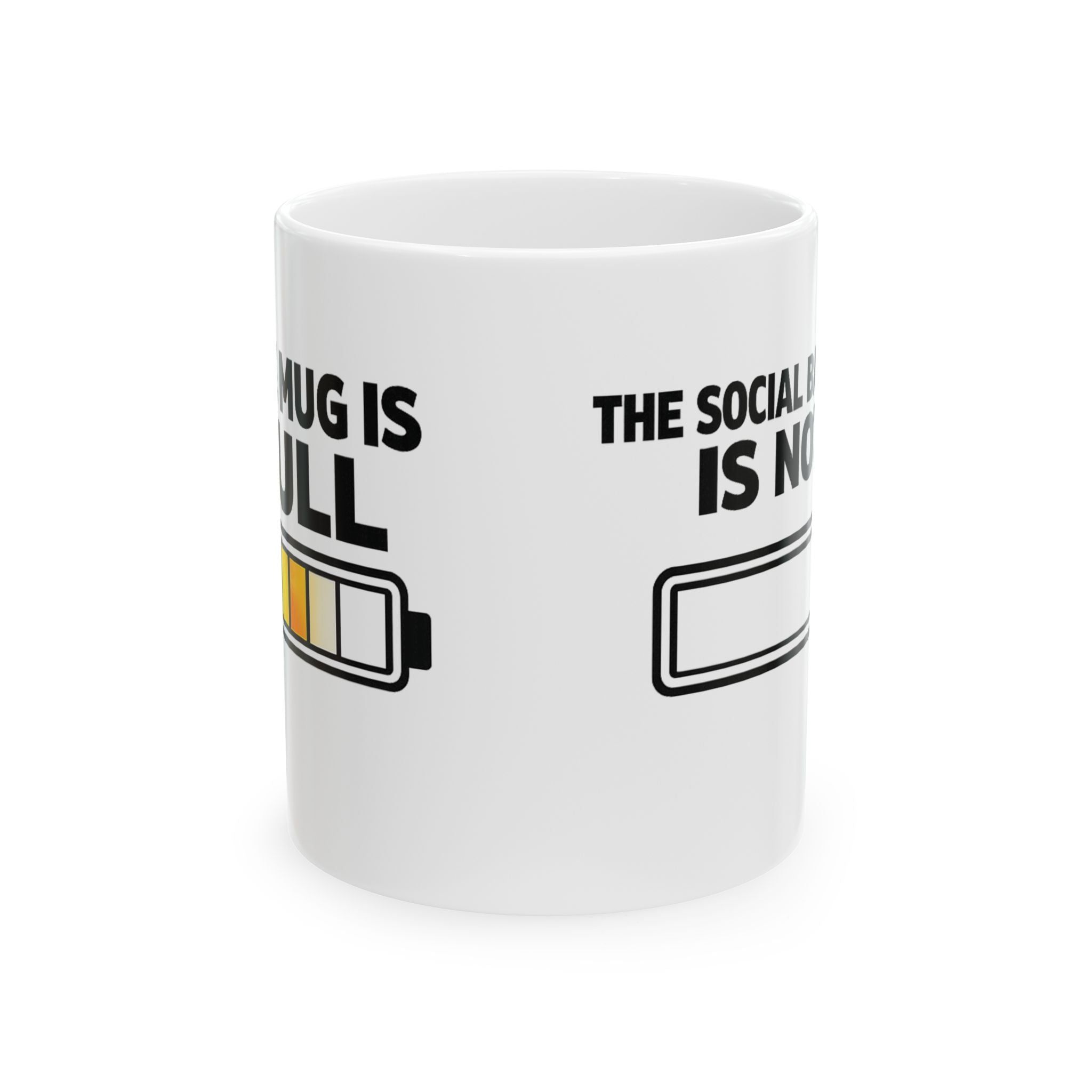 Social Battery Is Now funny ceramic coffee mug, lifestyle shot on desk