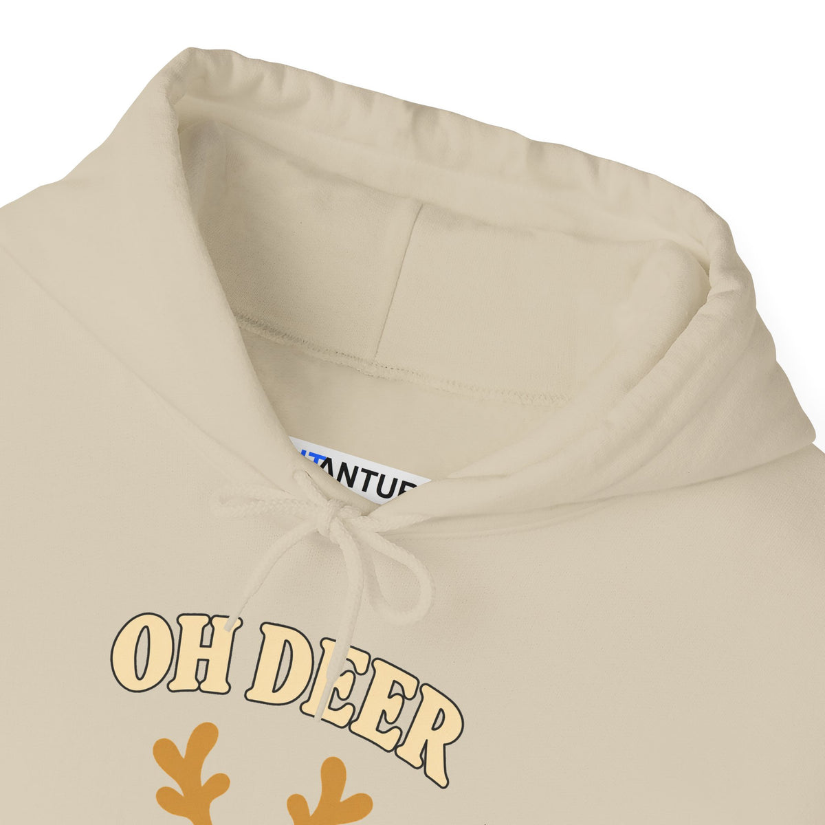 Close-up of a beige hoodie with a graphic print that reads 'OH DEER' in beige letters with brown antlers below, on a white background