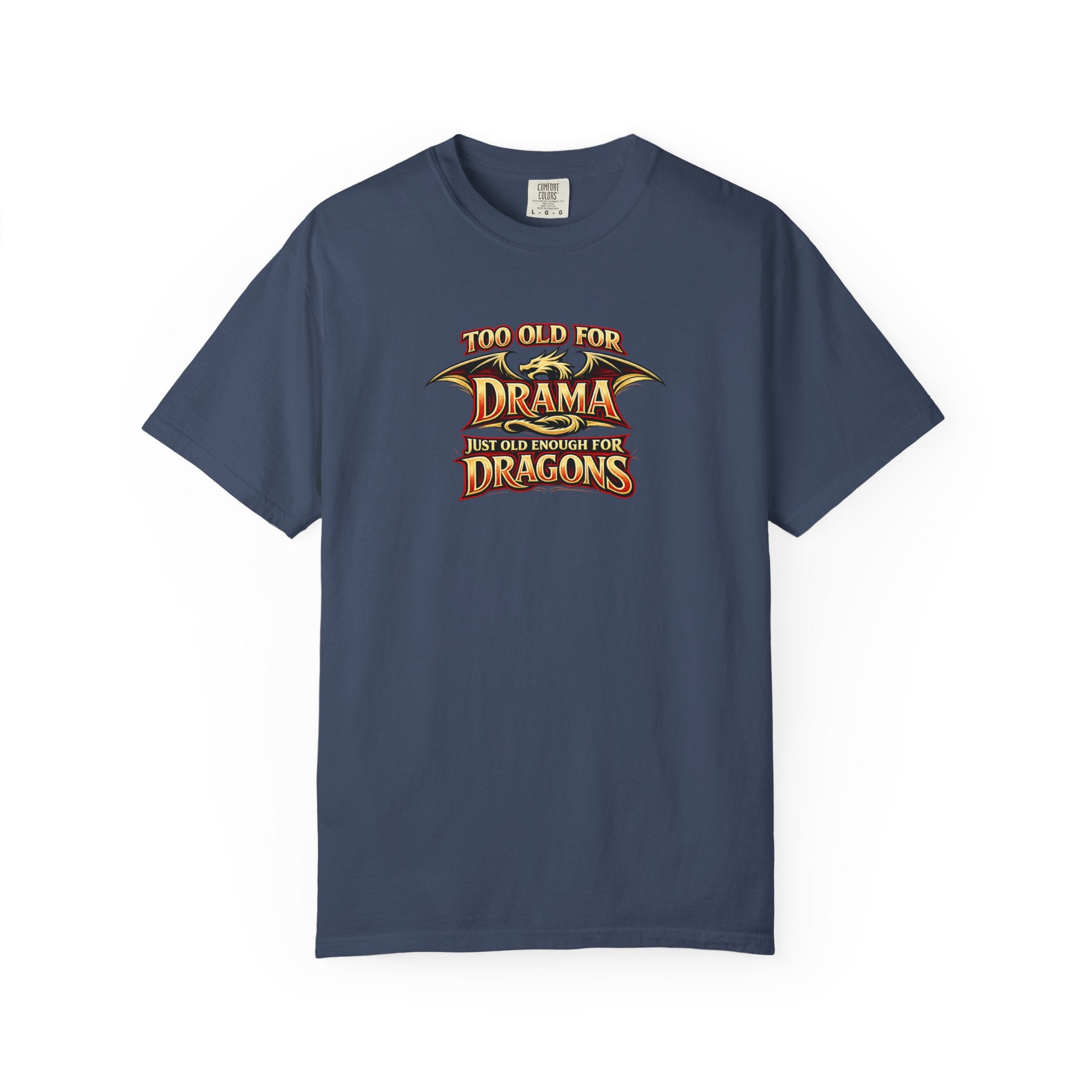 An blue short-sleeve crewneck t-shirt featuring a graphic print on the chest that reads 'TOO OLD FOR DRAMA BUT OLD ENOUGH FOR DRAGONS' in a stylized gold and black dragon-themed font.