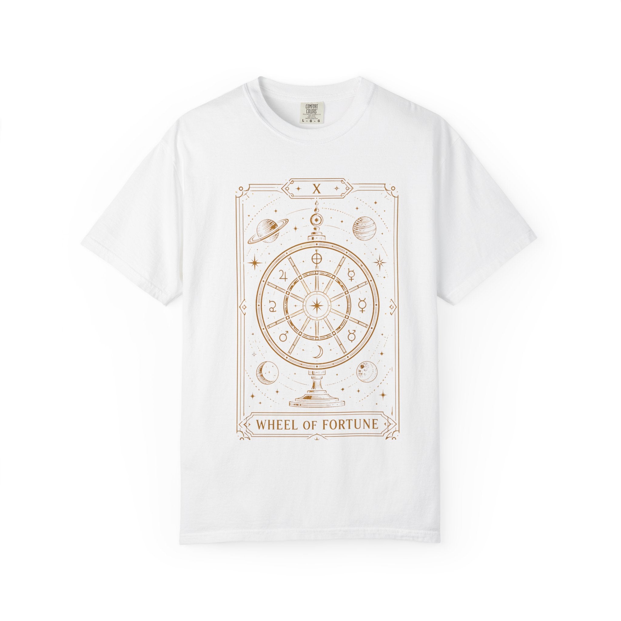 a white Comfort Colors t-shirt featuring Wheel of Fortune from the Future Arcana collection, inspired by the Wheel of Fortune tarot card. A celestial cosmic wheel surrounded by stars and planets is illustrated in elegant retro sci-fi gold line art within an Art Deco tarot frame on a transparent background