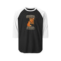 A raglan-style baseball T-shirt with w sleeves and a black body, decorated with a Christmas-themed graphic that reads 'ALL I WANT FOR CHRISTMAS IS TO BE A GRIFFIN' with an orange cat and a ggriffin illustration.