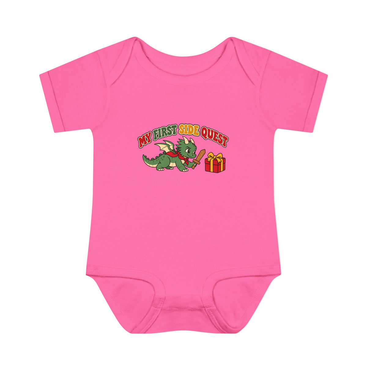 A bright pink short-sleeve baby bodysuit featuring a cartoon graphic of a green dragon wearing a red collar next to a red gift box, with the text 'MY FIRST SIDE QUEST' above it, displayed on a solid white background.