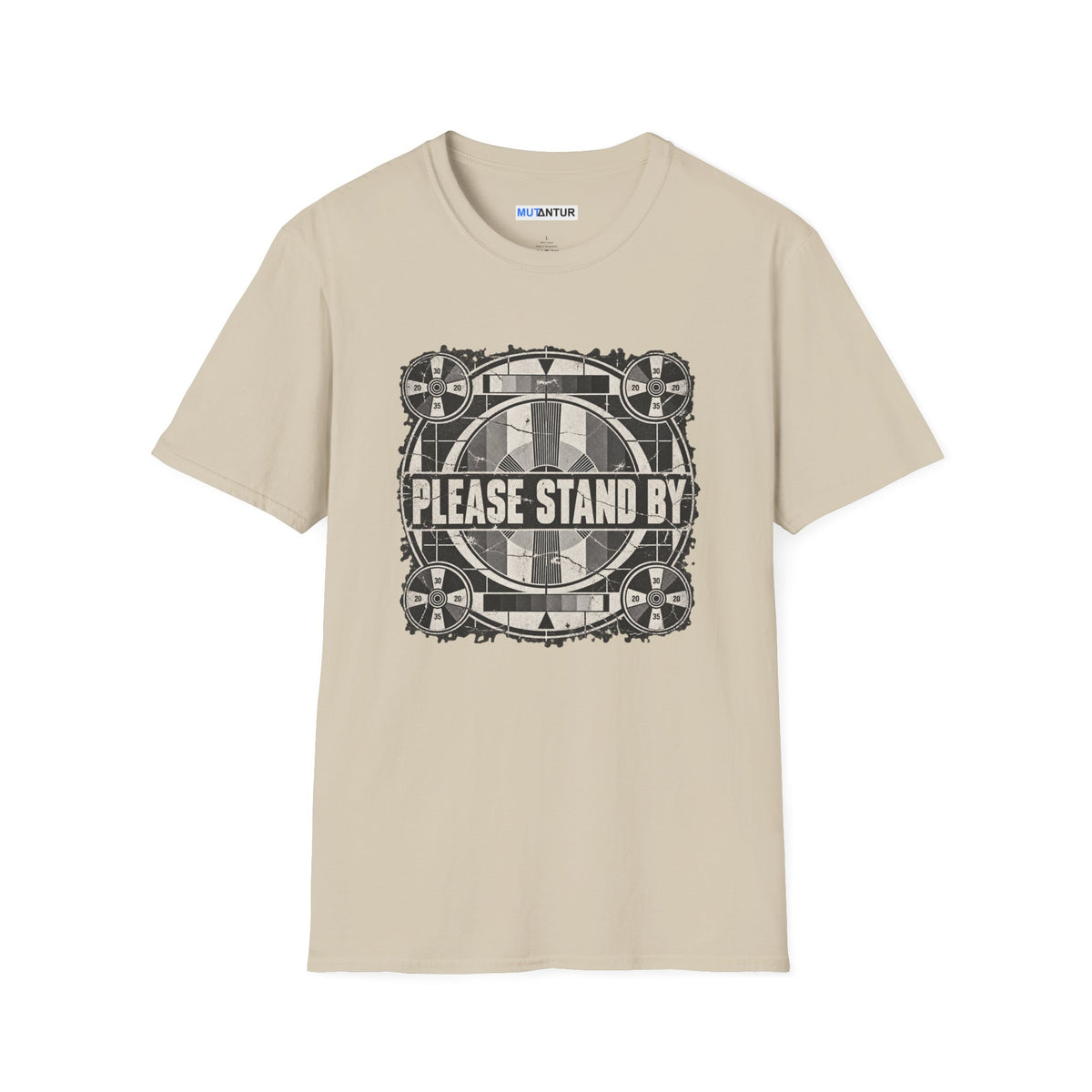 a beige crew neck t shirt with a retro black and white television display sign that reads  PLEASE STAND BY against a white background