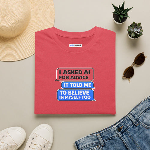 I Asked AI for Advice, It Told Me to Believe in Myself Too funny graphic tee in coral, folded flat lay styled with a straw hat, sunglasses, succulents, and jeans