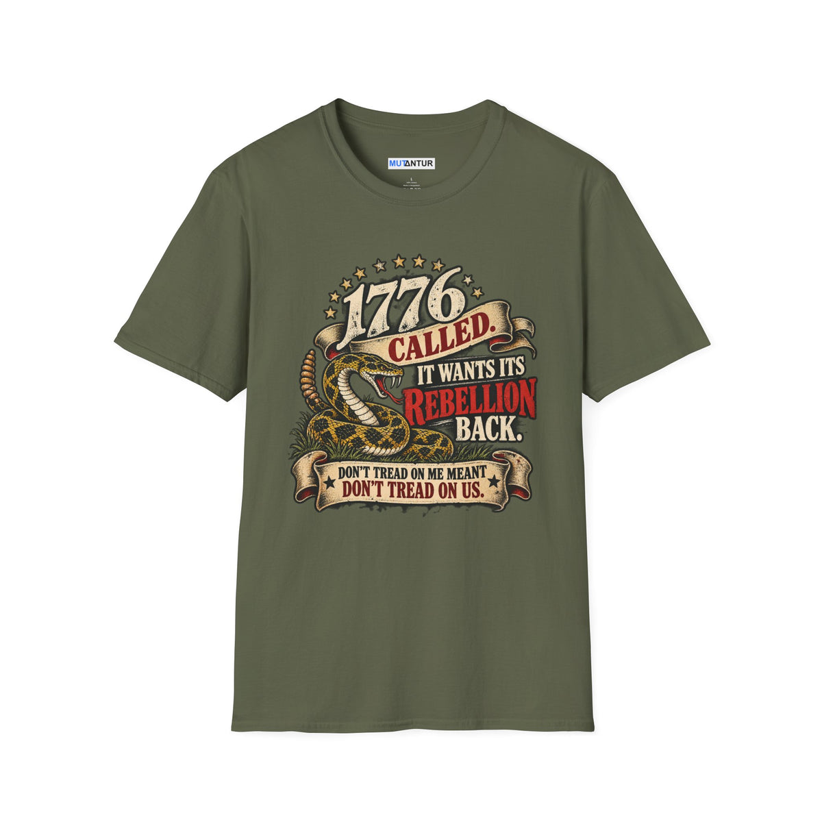A olive green short-sleeve crewneck t-shirt featuring a detailed graphic print on the front. The graphic depicts a coiled rattlesnake with the text '1776 CALLED IT WANTS ITS REBELLION BACK DONT TREAD ON ME MEANS DONT TREAD ON US  against a white background