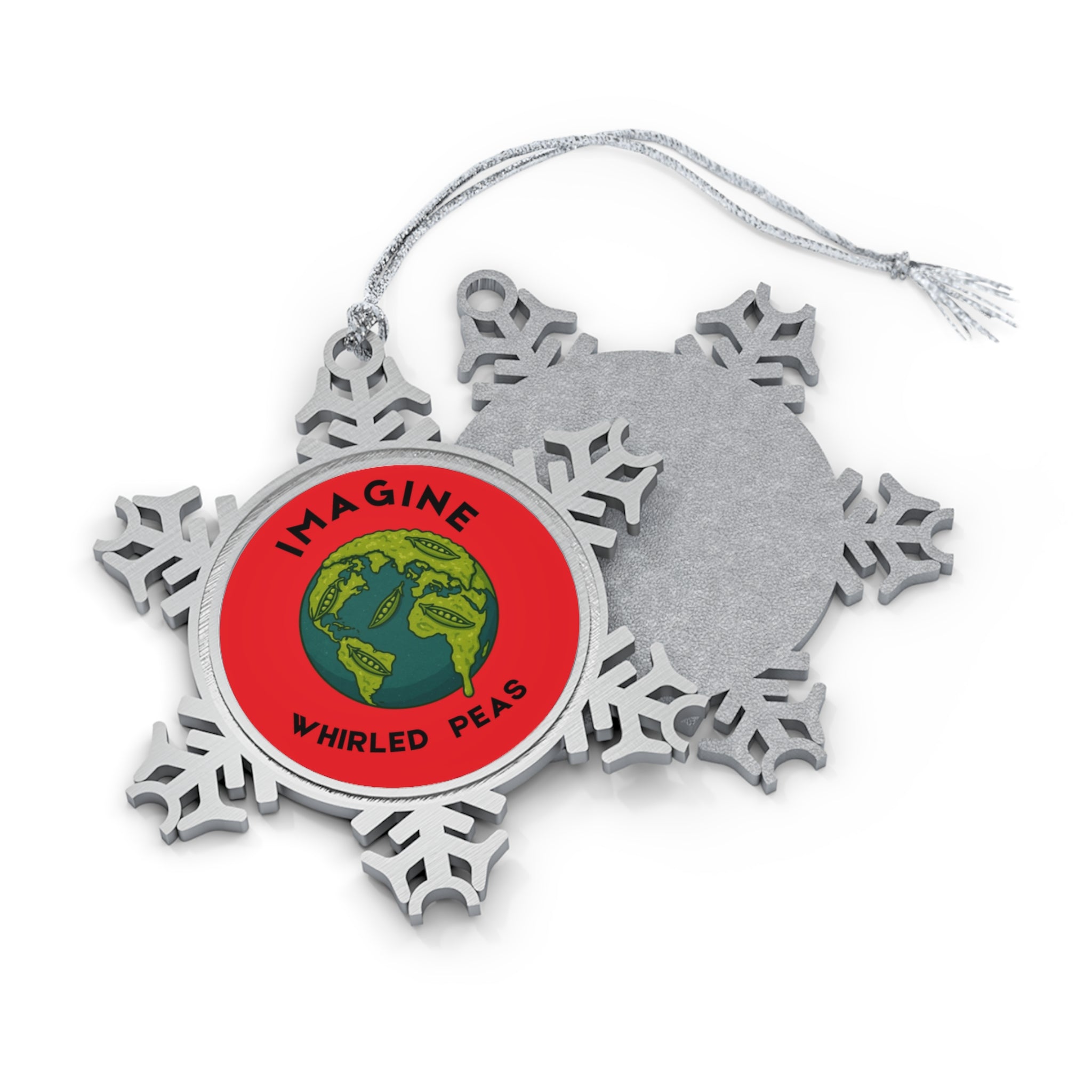 A silver snowflake-shaped Christmas ornament with a hanging string, showing both the front and back. The front features a red circular insert with a green and blue globe graphic and the text 'IMAGINE WHIRLED PEAS'.