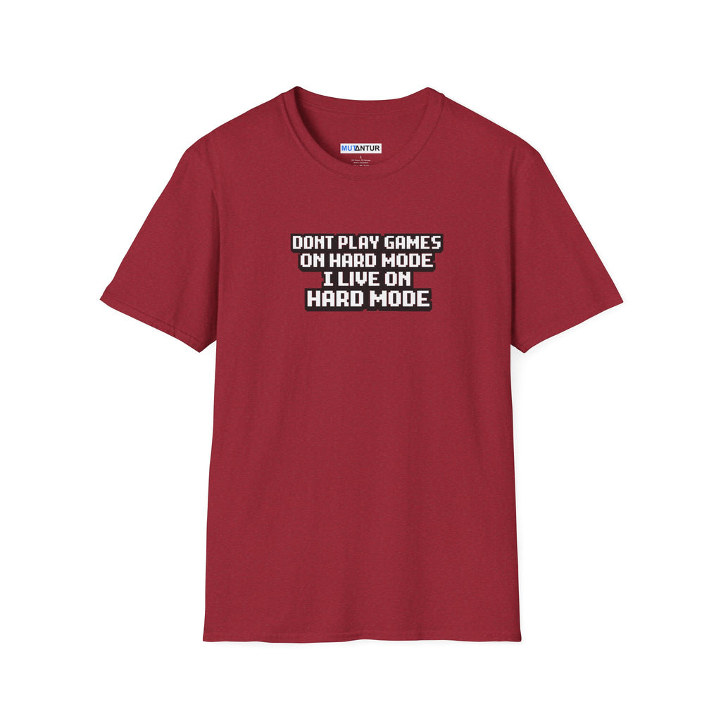 A red short-sleeve crewneck t-shirt with white text on the chest that reads 'DONT PLAY GAMES ON HARD MODE I LIVE ON HARD MODE'.