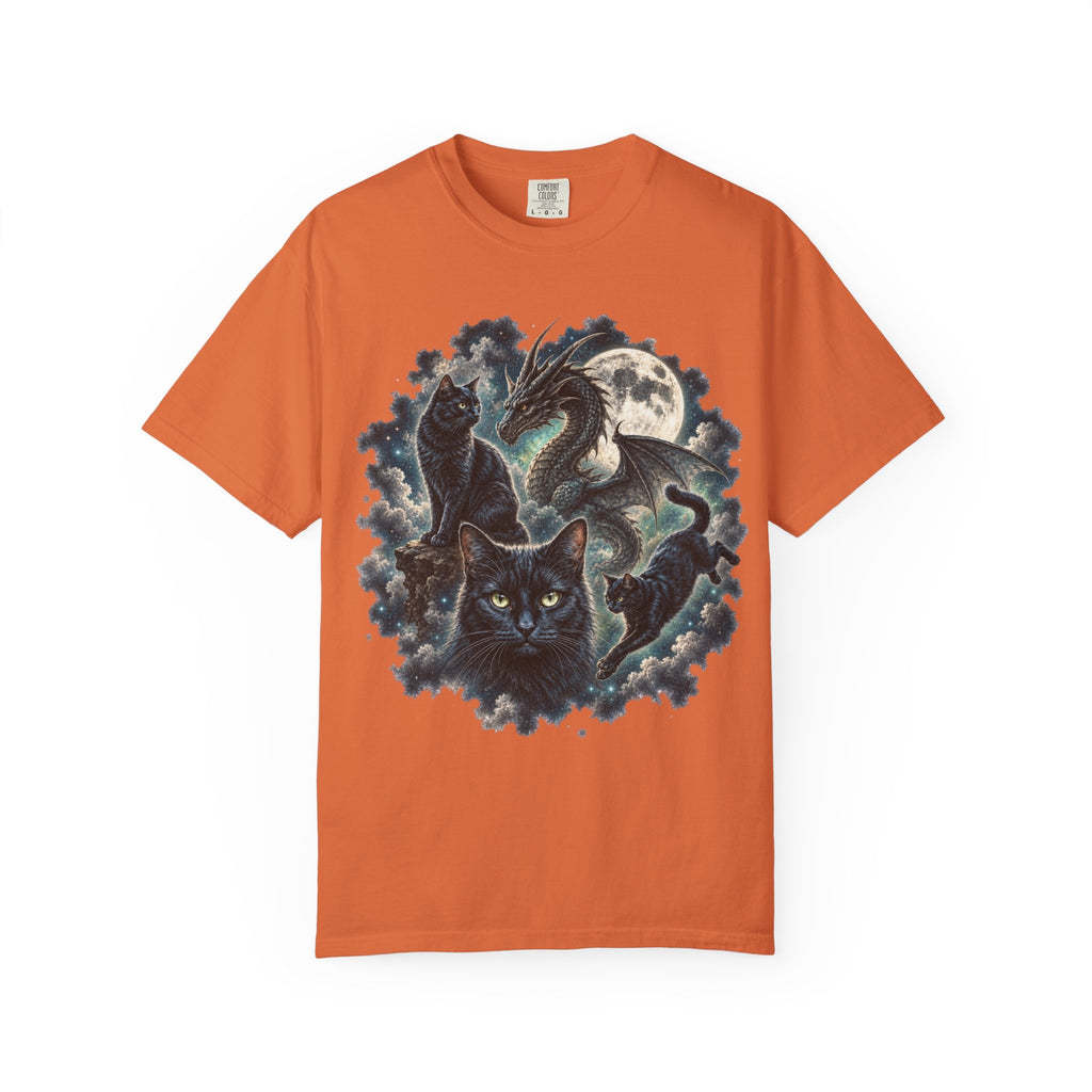 An orange short-sleeve crewneck t-shirt featuring a detailed graphic print of a black cat, a dragon, and a full moon surrounded by swirling dark clouds on the front.