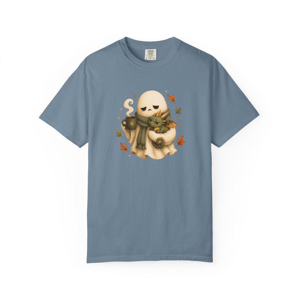 A dusty slate blue short-sleeve t-shirt with a central graphic of a cute cartoon ghost wearing a green scarf and holding a small green dragon  surrounded by orange autumn leaves.