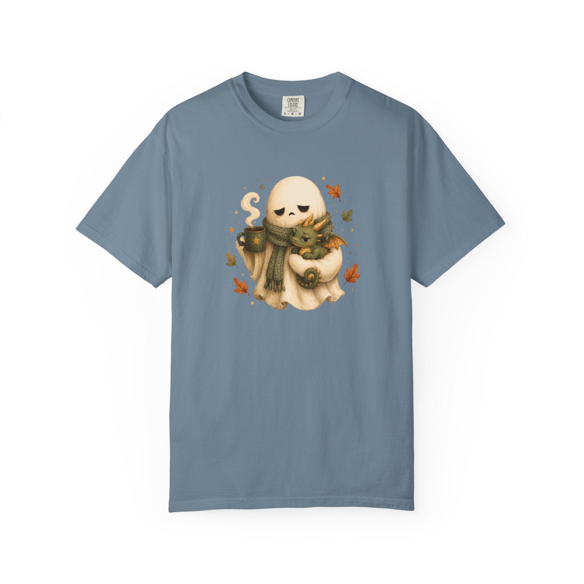 A dusty slate blue short-sleeve t-shirt with a central graphic of a cute cartoon ghost wearing a green scarf and holding a small green dragon  surrounded by orange autumn leaves.