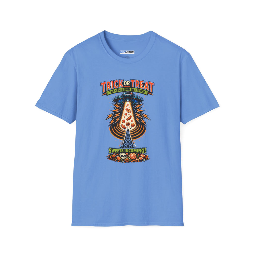 A light blue t-shirt featuring a colorful graphic print on the front. The graphic shows a UFO Beaming up candy flying upward from a haunted house under the text 'TRICK OR TREAT' and 'SWEETS COMING !', 