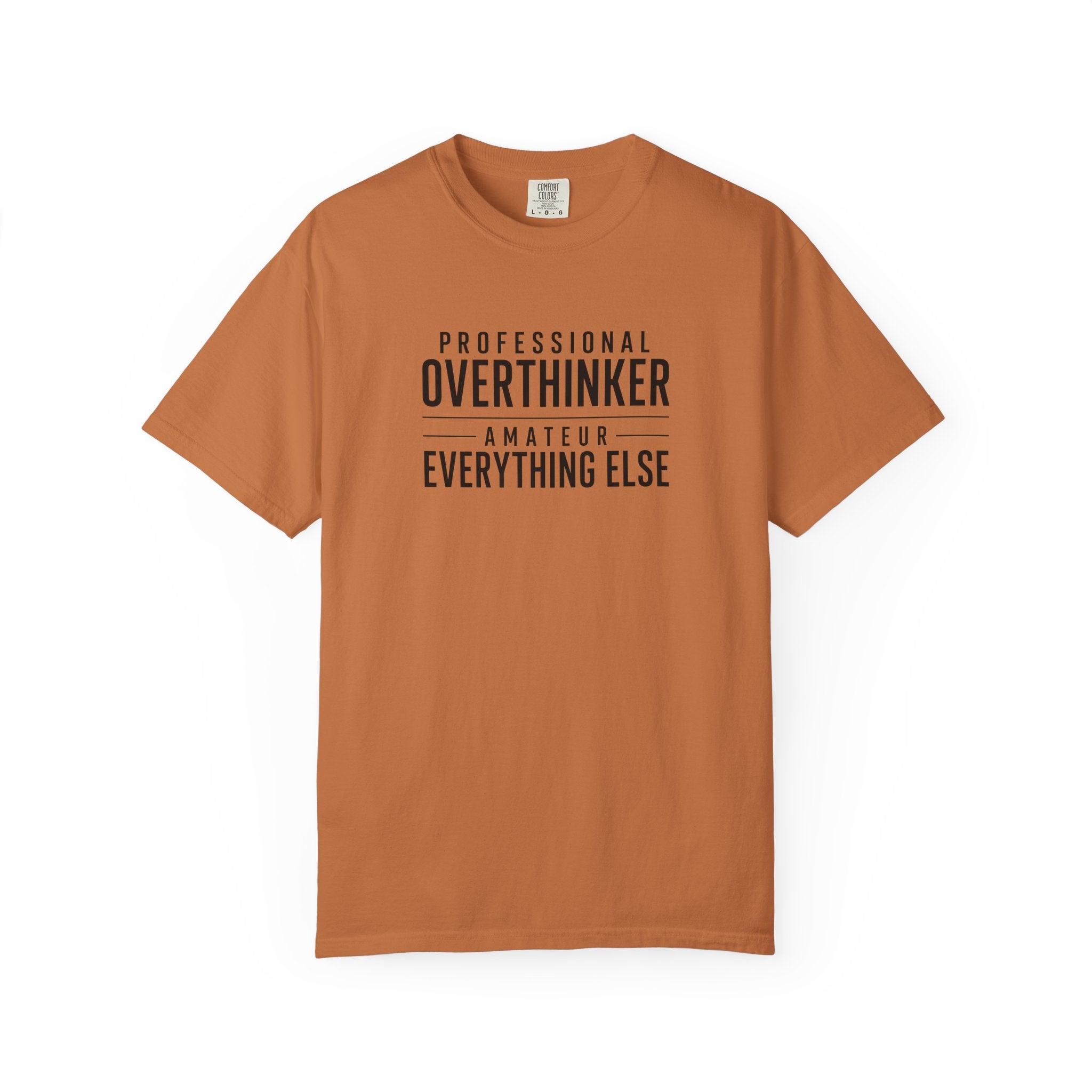 A rust-orange short-sleeve crewneck t-shirt with black printed text on the chest reading 'PROFESSIONAL OVERTHINKER AMATEUR EVERYTHING ELSE', displayed flat against a plain white background.