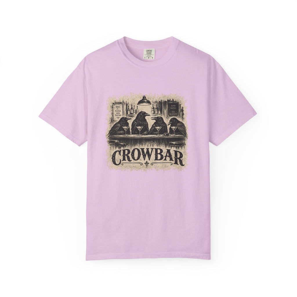 A light purple short-sleeve crewneck t-shirt featuring a vintage-style graphic of four crows sitting at a bar with the text 'CROWBAR' printed below, displayed on a clean white background.