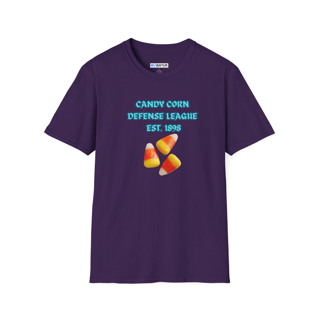 A purple short-sleeve t-shirt with a graphic on the front that reads 'CANDY CORN DEFENSE LEAGUE EST. 1898' in light blue text above three candy corn illustrations, shown on a plain white background.