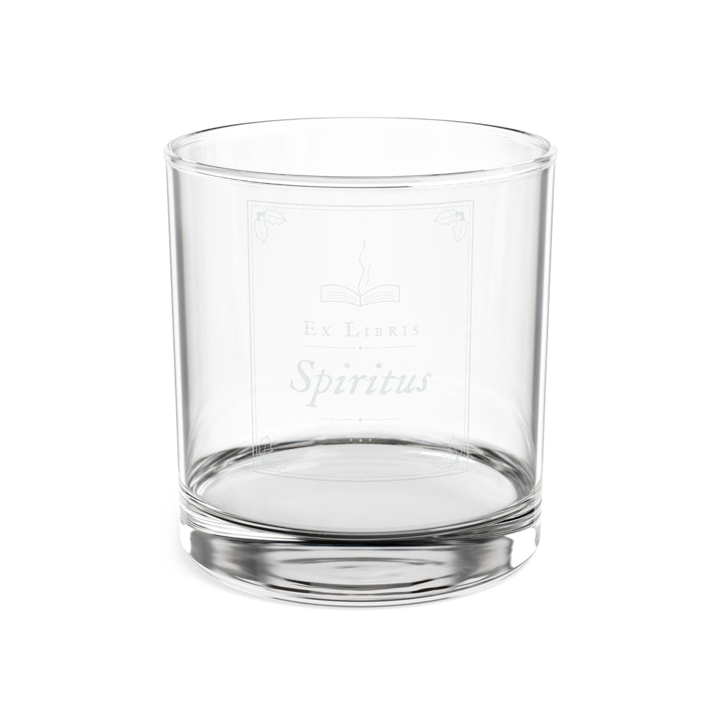 Clear glass tumbler with 'Ex Libre Spiritus' engraving on a white background