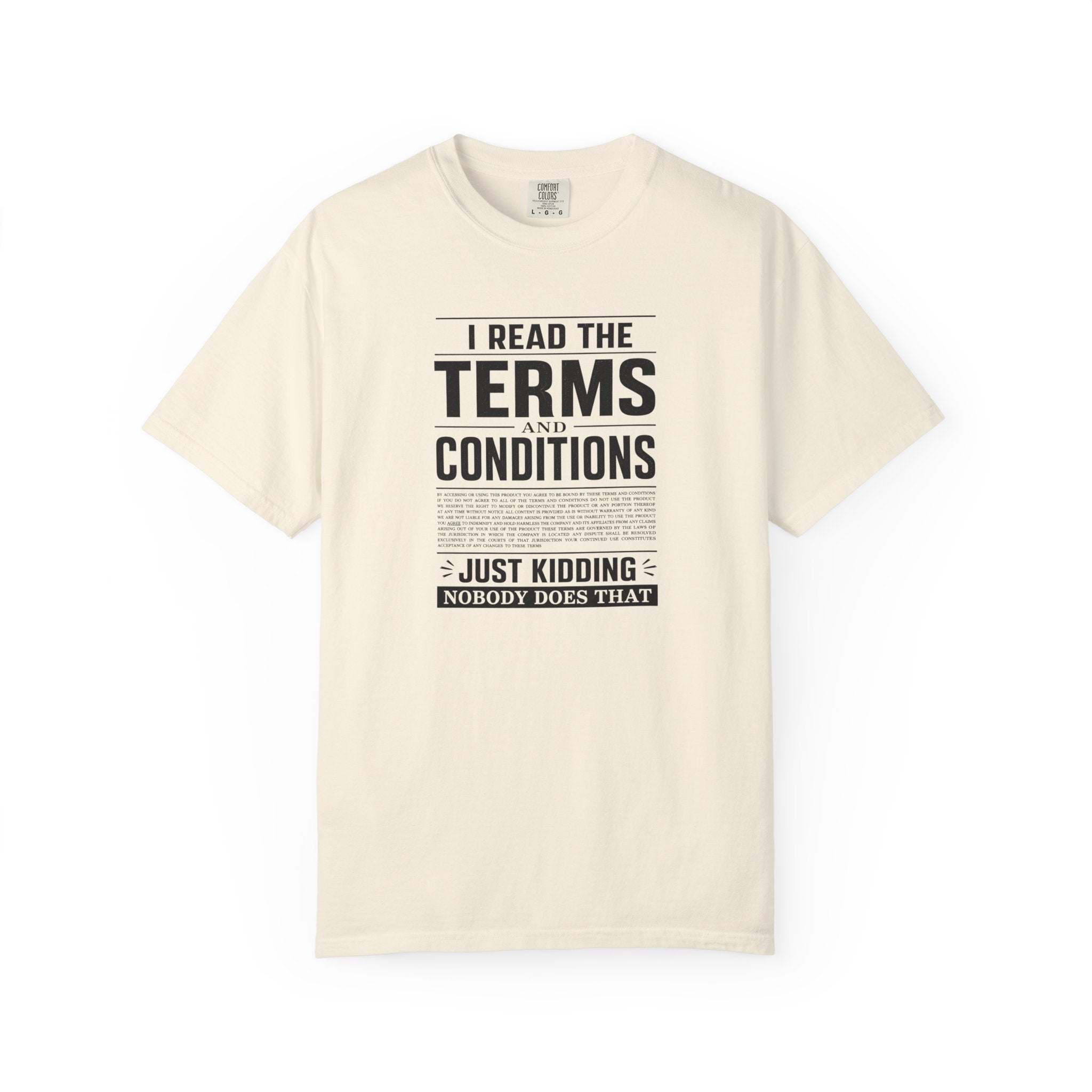 An off-white short-sleeve t-shirt with a black graphic print on the front that reads 'I READ THE TERMS AND CONDITIONS JUST KIDDING NOBODY DOES THAT' styled like a newspaper headline.