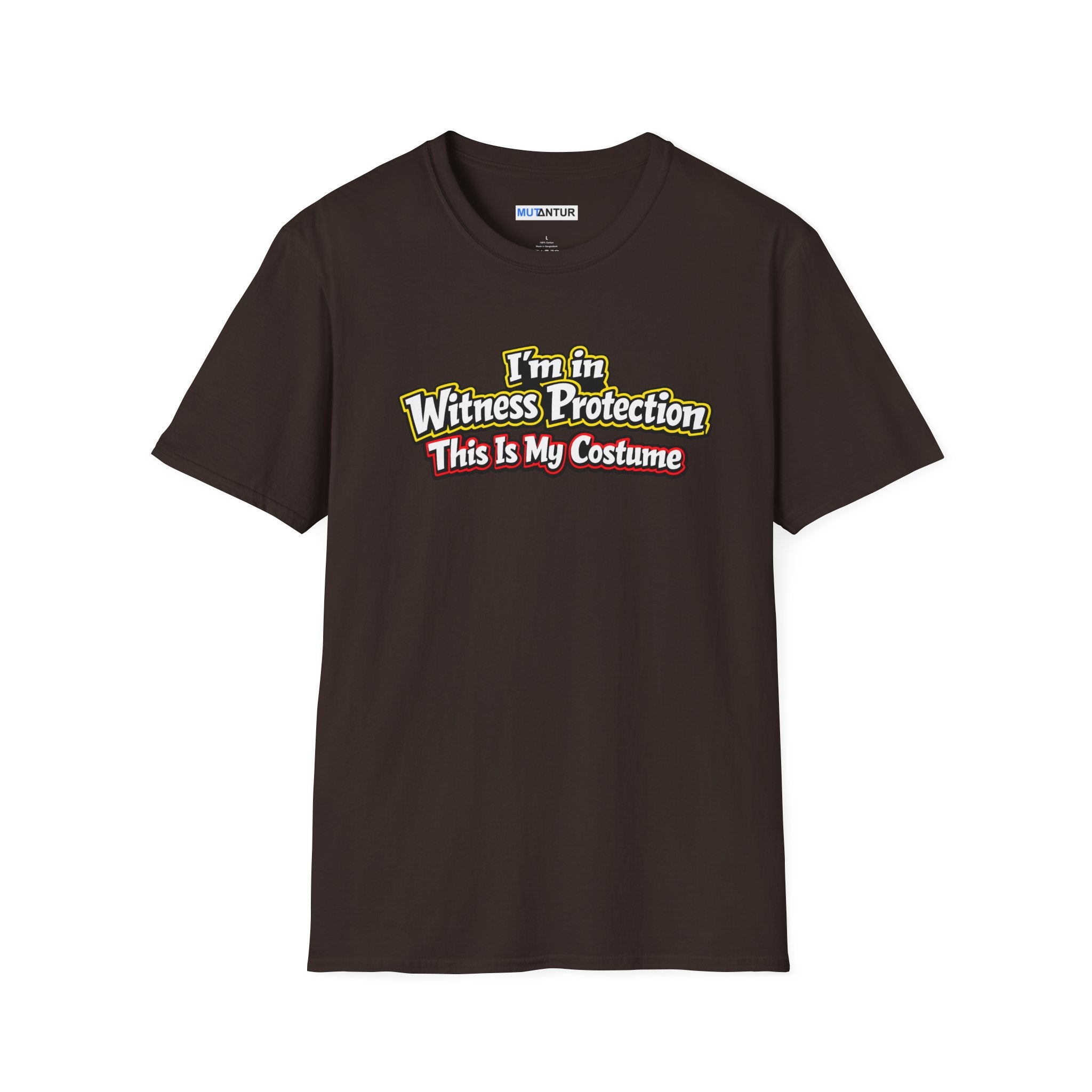 Brown short-sleeve crewneck t-shirt featuring a graphic on the chest that reads 'I'm in Witness Protection This Is My Costume' in a stylized, vintage font with green, yellow, and red accents